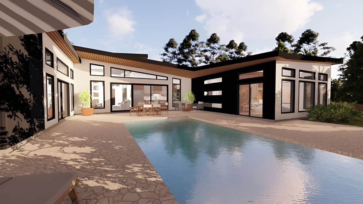 Contemporary custom home exterior with in-ground pool and courtyard.