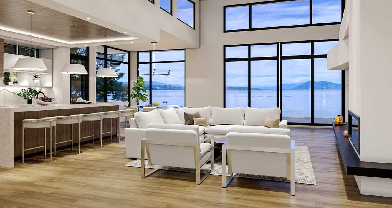 Modern open-concept living room with large windows and ocean view in Victoria BC.
