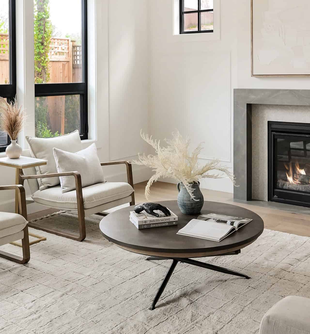 White Wolf Homes - modern living room with fireplace and natural light in Victoria BC.