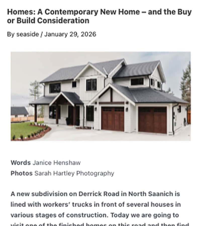 Victoria BC custom home by White Wolf Homes with two-car garage and modern design.