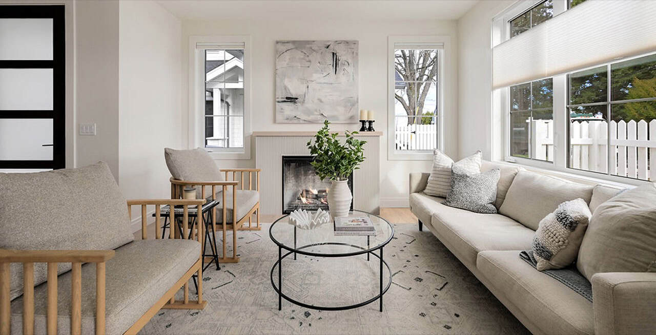 Elegant living room by White Wolf Homes Victoria BC with neutral tones and modern seating.