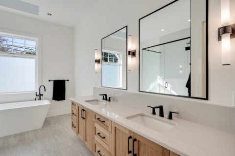 White Wolf Homes: modern double vanity and spa-like bathroom in Willowmere project.
