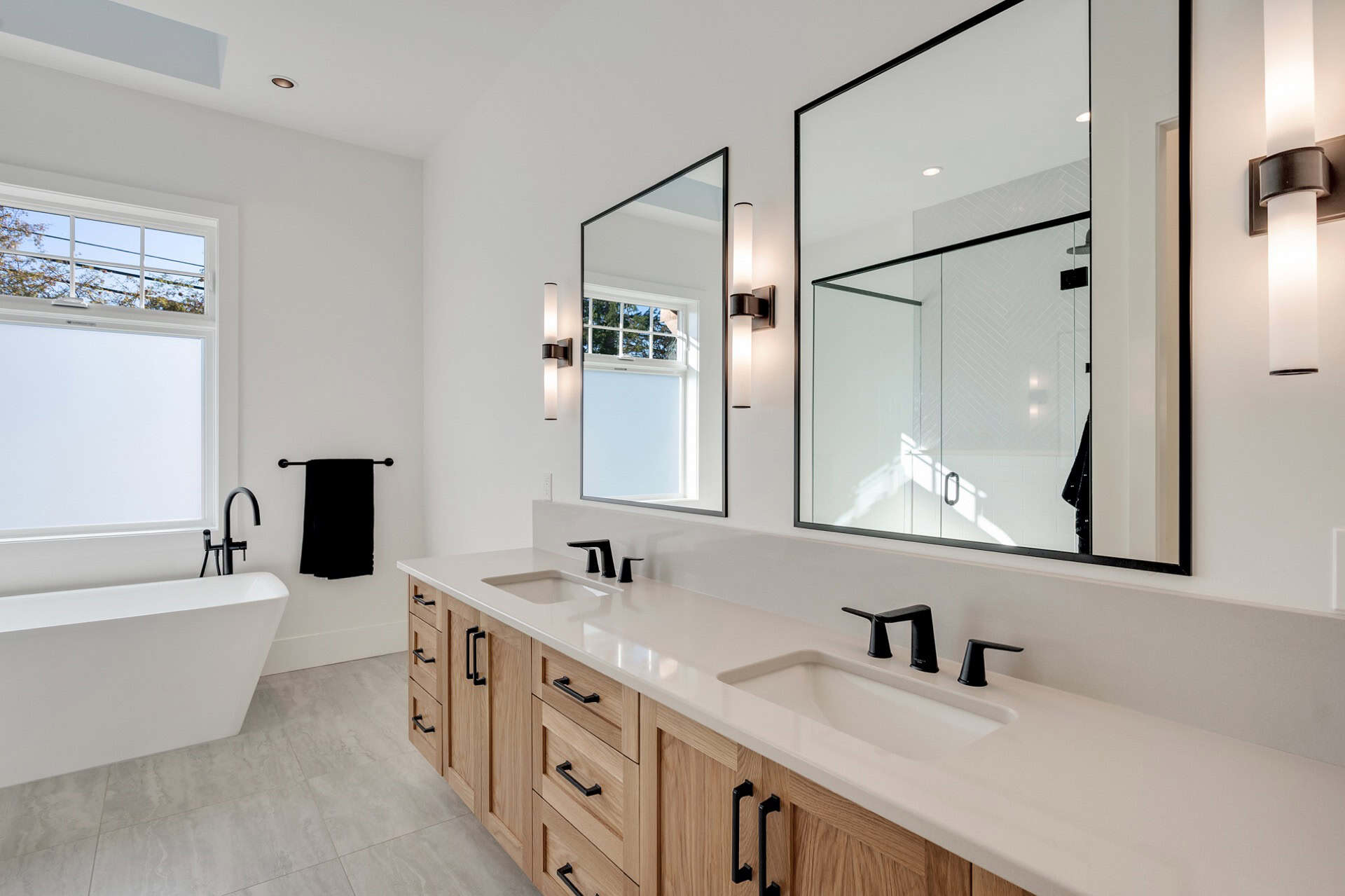 White Wolf Homes: modern double vanity and spa-like bathroom in Willowmere project.