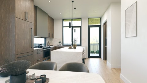 Modern kitchen and dining area in a Victoria BC home by White Wolf Homes.