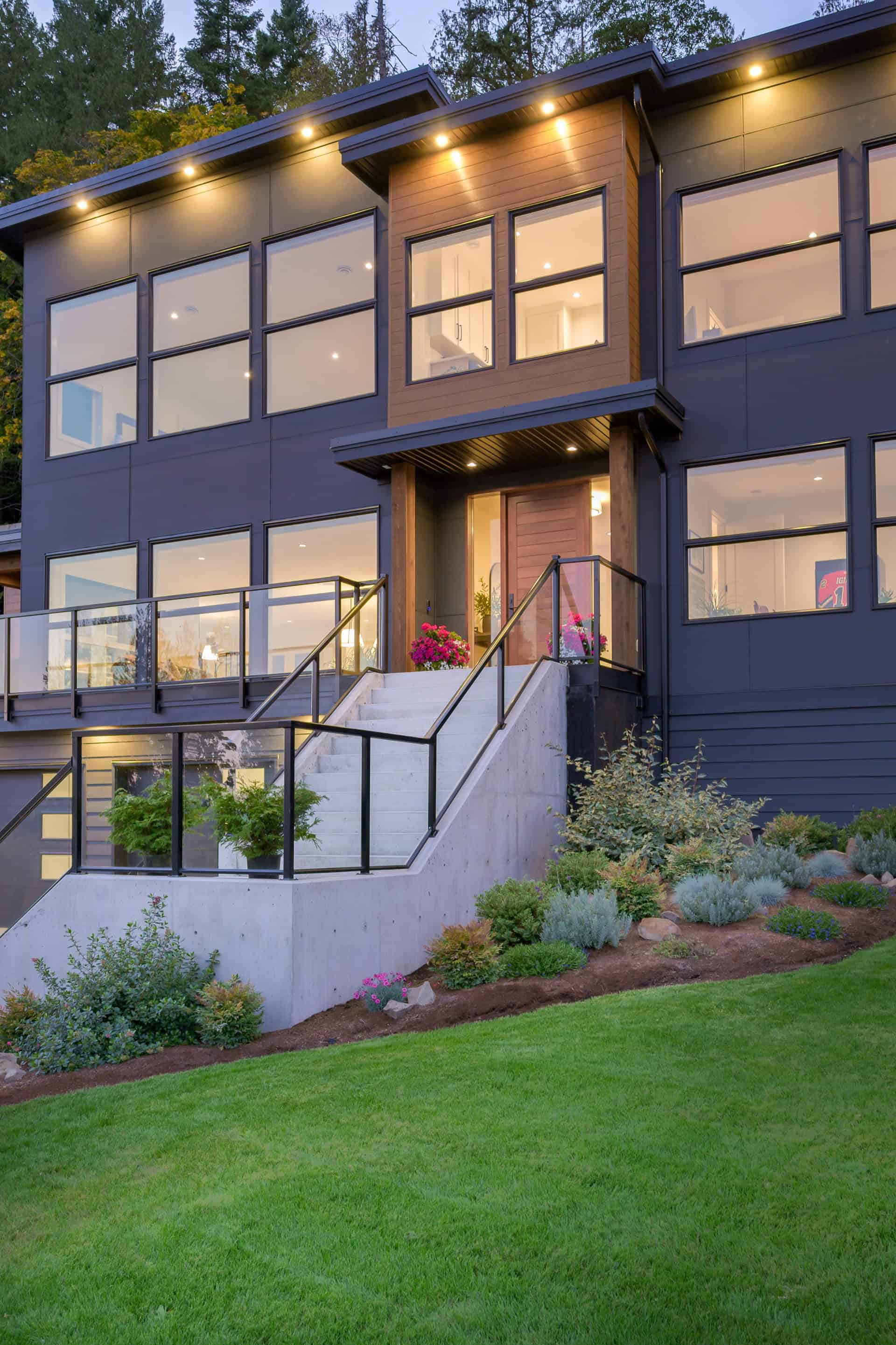 Modern custom home exterior by White Wolf Homes, Victoria BC neighborhood.